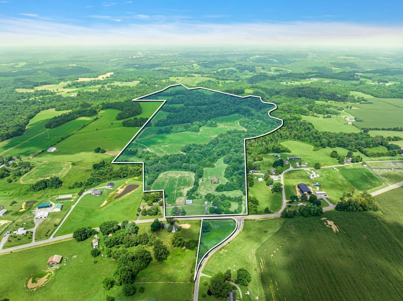 151.7 Acres in Macon County, Tennessee Charming Farmhouse on