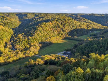 CEDAR RIDGE FARM   240± Acre Barndominium Estate, Working Farm & Premier Hunting Retreat