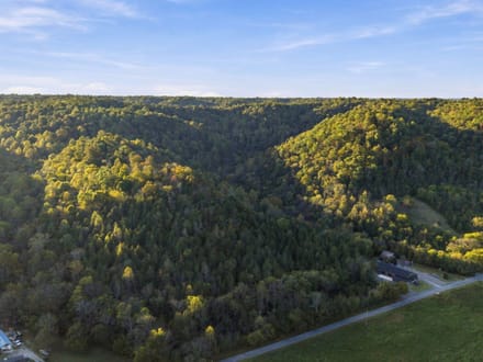 CEDAR RIDGE FARM   240± Acre Barndominium Estate, Working Farm & Premier Hunting Retreat