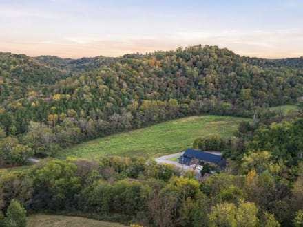 CEDAR RIDGE FARM   240± Acre Barndominium Estate, Working Farm & Premier Hunting Retreat