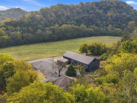 CEDAR RIDGE FARM   240± Acre Barndominium Estate, Working Farm & Premier Hunting Retreat