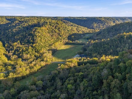 CEDAR RIDGE FARM   240± Acre Barndominium Estate, Working Farm & Premier Hunting Retreat