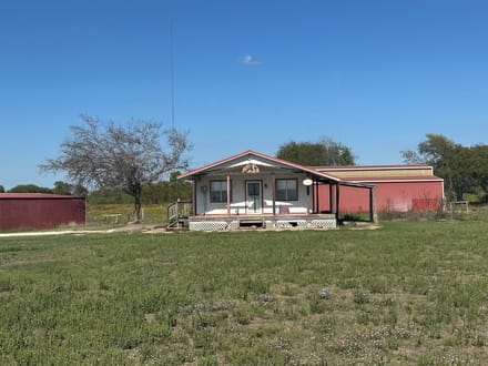 15.404 Acres with Home, Pond & Large Barn in Moody, Texas
