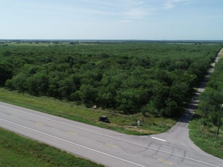 2 sides road frontage acreage near Charco!