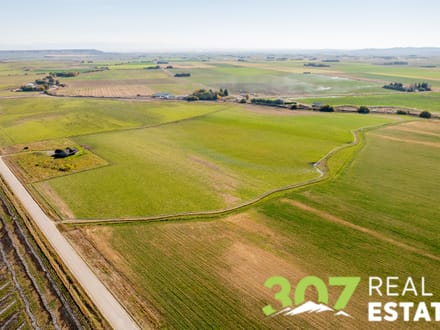 Heart Mountain Views with 42 Acres