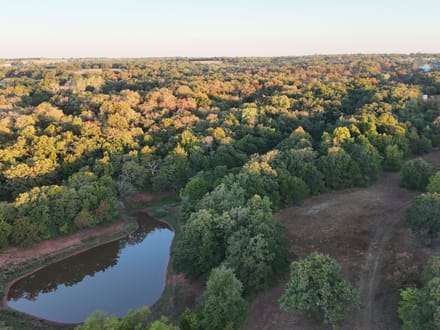 63 Acres | Land for Sale Guthrie OK — Two Ponds, Creeks, Water Well, 57 Adjoining Acres Available