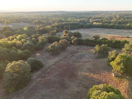 63 Acres | Land for Sale Guthrie OK — Two Ponds, Creeks, Water Well, 57 Adjoining Acres Available