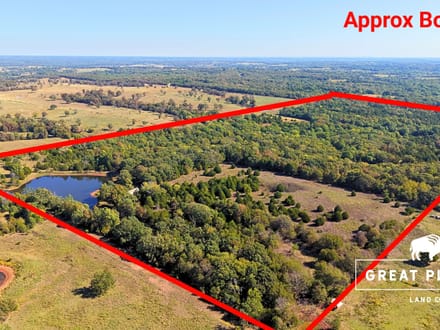80 Acres with 2-Acre Stocked Fishing Pond & Hunting Cabin