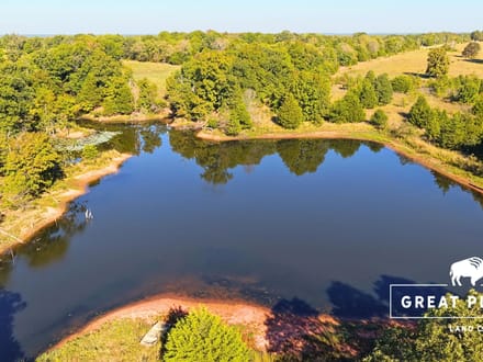 80 Acres with 2-Acre Stocked Fishing Pond & Hunting Cabin