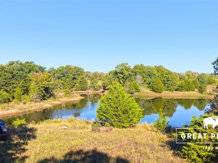 80 Acres with 2-Acre Stocked Fishing Pond & Hunting Cabin