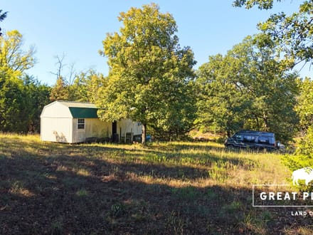80 Acres with 2-Acre Stocked Fishing Pond & Hunting Cabin