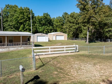 98 +/- Acres of Prime Deer & Turkey Hunting Land with Trails, Pond, Home & Shops | Sharp County, Near Hardy, Arkansas
