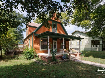 Cabin Styled Home with Impressive Garage in Fredonia