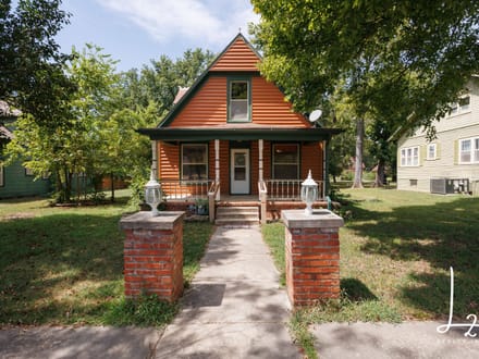 Cabin Styled Home with Impressive Garage in Fredonia