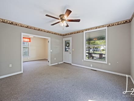 Cabin Styled Home with Impressive Garage in Fredonia