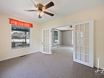 Cabin Styled Home with Impressive Garage in Fredonia