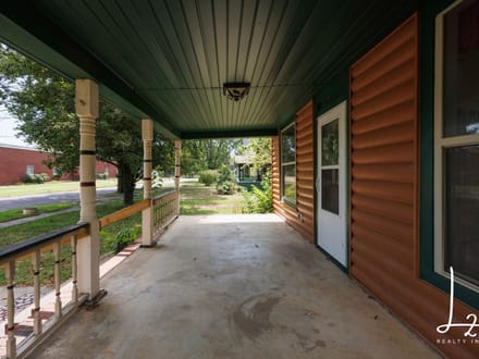 Cabin Styled Home with Impressive Garage in Fredonia