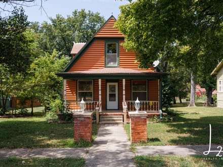 Cabin Styled Home with Impressive Garage in Fredonia