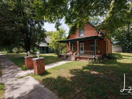 Cabin Styled Home with Impressive Garage in Fredonia