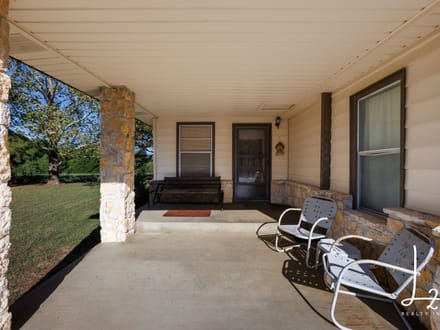 Private Country Living on 5± Acres with Creek & Mature Pines