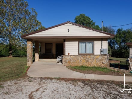 Private Country Living on 5± Acres with Creek & Mature Pines