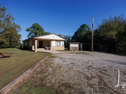 Private Country Living on 5± Acres with Creek & Mature Pines