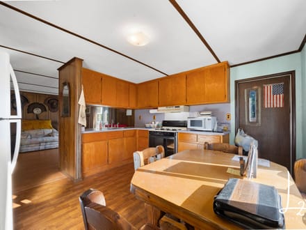 Private Country Living on 5± Acres with Creek & Mature Pines