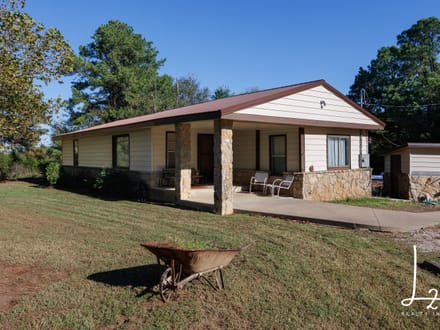 Private Country Living on 5± Acres with Creek & Mature Pines