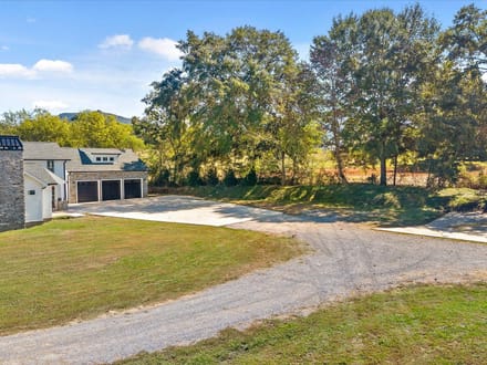 Step into a remarkable blend of historic charm and modern luxury at 986 Ketner Mill Lane.