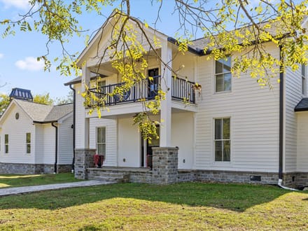 Step into a remarkable blend of historic charm and modern luxury at 986 Ketner Mill Lane.