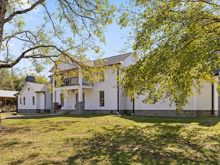 Step into a remarkable blend of historic charm and modern luxury at 986 Ketner Mill Lane.