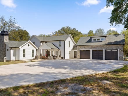 Step into a remarkable blend of historic charm and modern luxury at 986 Ketner Mill Lane.