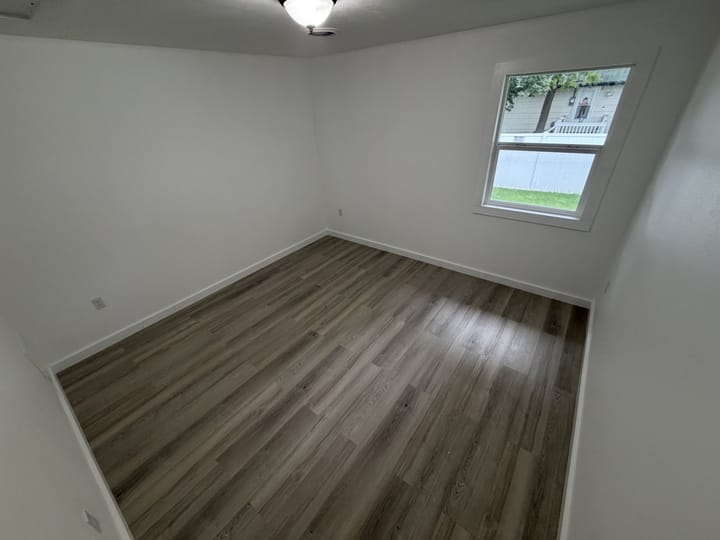Empty Room Plank Flooring Residential Property Nebraska E Rd St Paxton Ne Nebraska 612 E 3rd St Paxton Ne