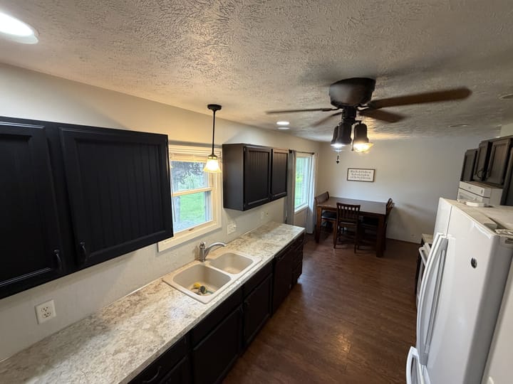 Kitchen Sink Area With Dark Cabinets Nebraska Rd Street Sutherland Ne Nebraska 1240 3rd Street Sutherland Ne 69165