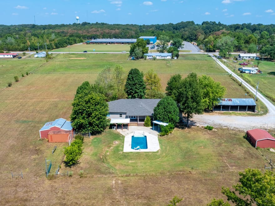 Private 7 +/- Acre Country Retreat | Renovated Home, Saltwater Pool & Barns, Cave City, AR