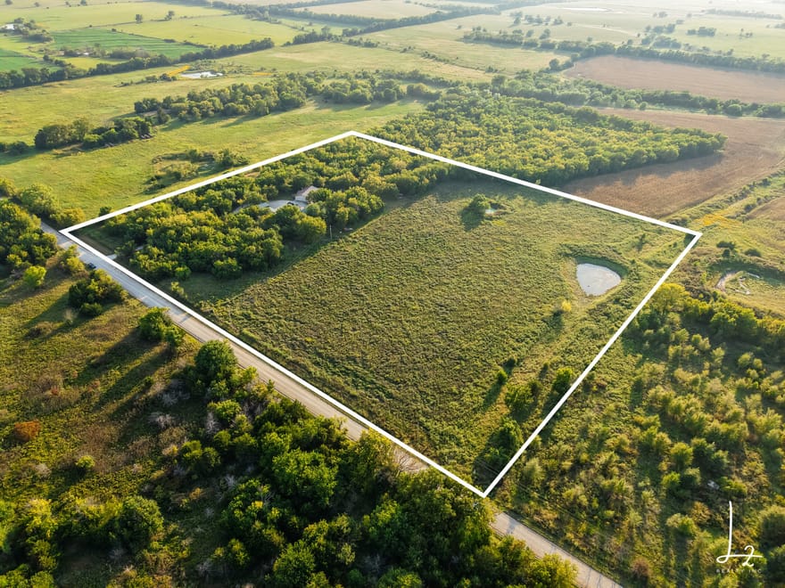 Farmhouse retreat on +/- 14 acres