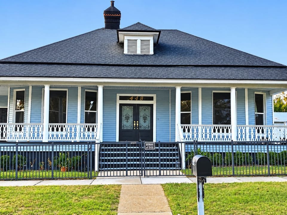 Classic Blue Bungalow With Wraparound Porch